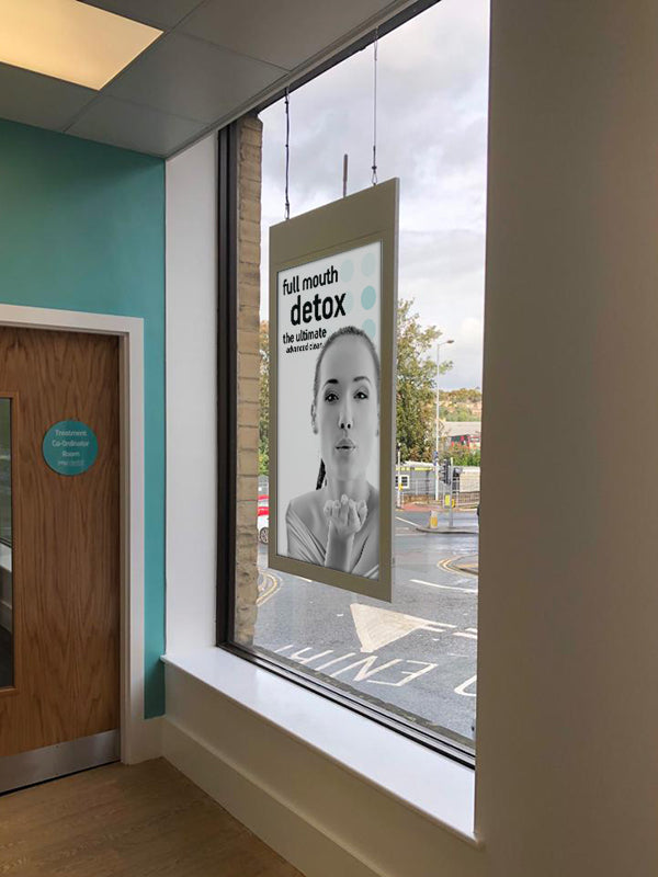 Double sided hanging digital window display