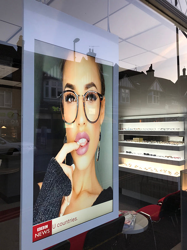 Double sided hanging digital window display