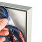 Image showing installation of fabric graphic into aluminium frame